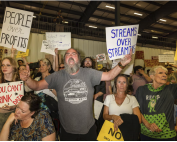 Petitioners react as the Box Elder county commission announces approval of a large datacenter on 4 May 2026 in Tremonton, Utah. Photograph: Natalie Behring/Getty Images
