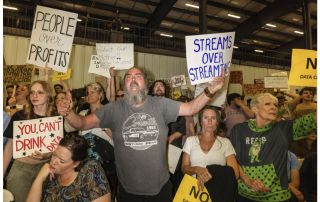Petitioners react as the Box Elder county commission announces approval of a large datacenter on 4 May 2026 in Tremonton, Utah. Photograph: Natalie Behring/Getty Images